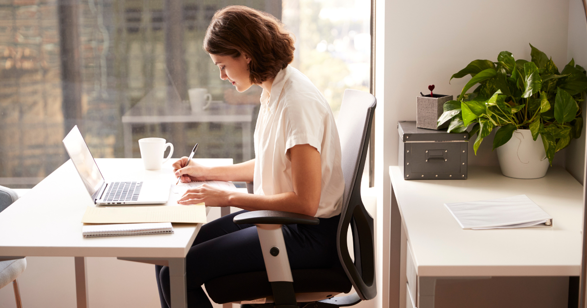 Office worker sitting at a desk for long hours. 